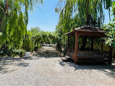 1250 متر باغ ویلا سرسبز داخل مجموعه ویلایی در اسفندآباد ملارد